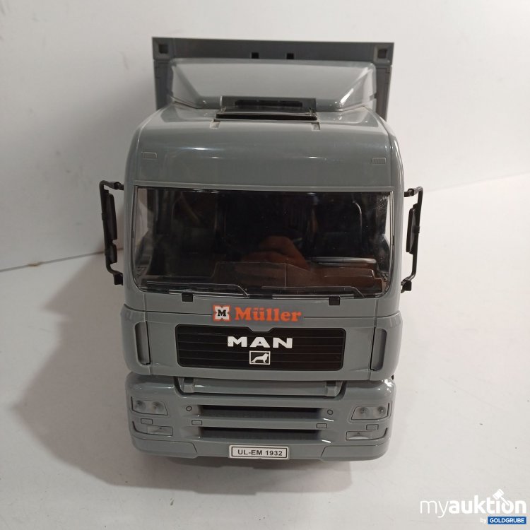 Artikel Nr. 983208 Artikel Nr. 983208: MAN TGA LKW mit Container-Wechselbrücke, Müller Drogerie Edition, Maßstab 1:16
