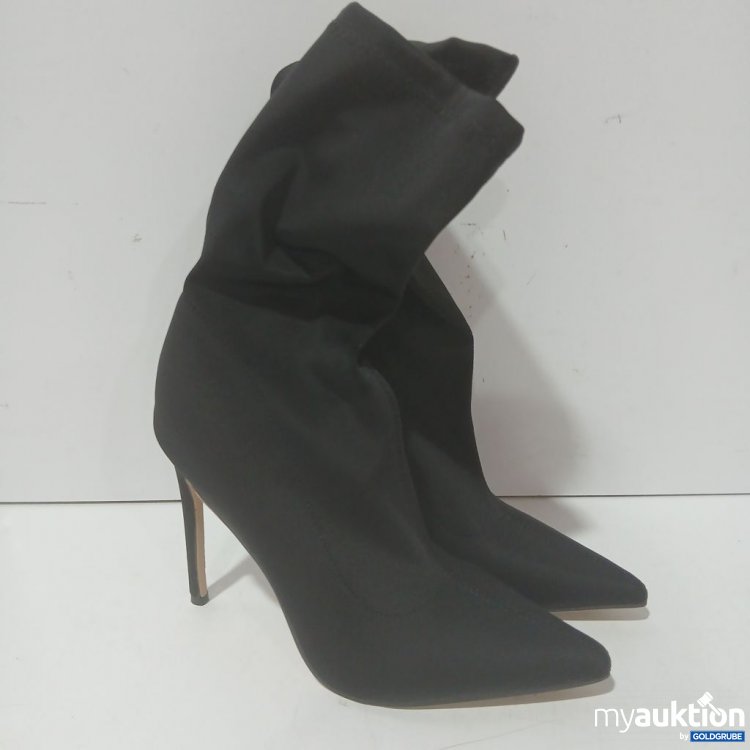 Artikel Nr. 993354 Artikel Nr. 993354: Schwarze Stiefel mit hohem Absatz und einem faltbaren Schaft. Größe EUR 38.