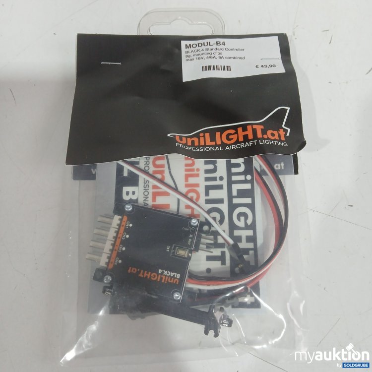 Artikel Nr. 989425 Artikel Nr. 989425: Unilight Modul-B4 black, 4 Standard Controller 9g, mounting clips max 16V, 4/6A, 8A combined