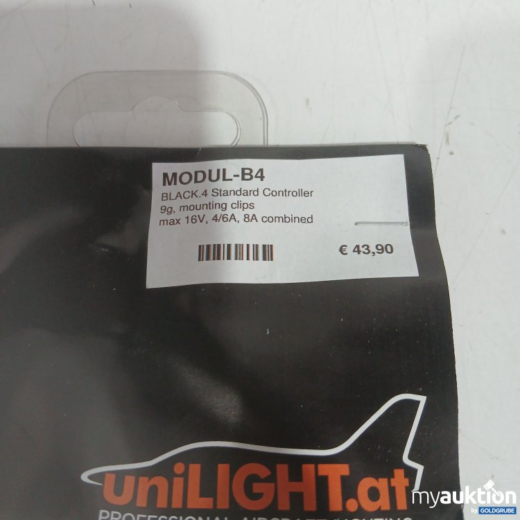 Artikel Nr. 989425 Artikel Nr. 989425: Unilight Modul-B4 black, 4 Standard Controller 9g, mounting clips max 16V, 4/6A, 8A combined
