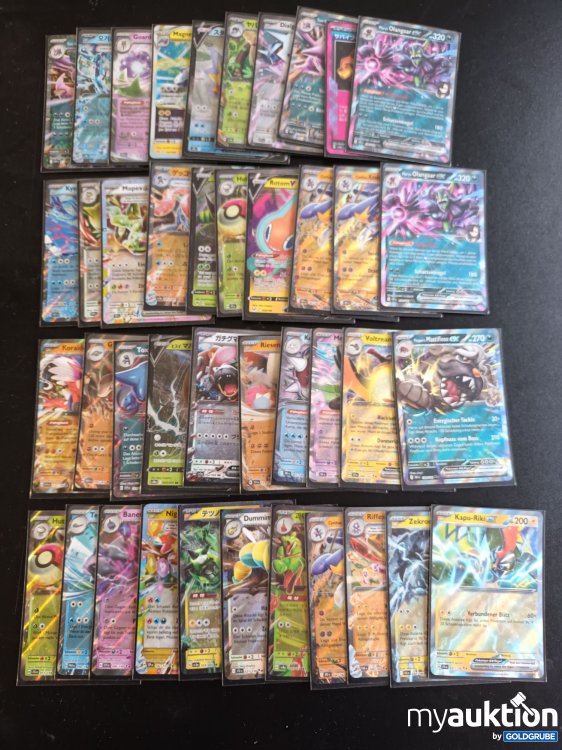 Artikel Nr. 907578: 41 glitzernde Pokemon Karten in Schutzhülle 