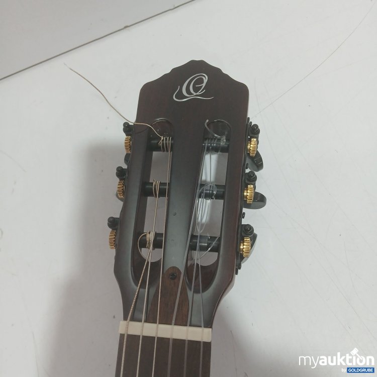 Artikel Nr. 461594: Ortega TourPlayer Standard ThinLine Crossover Nylon-String E-Gitarre mit Aufbewahrungstasche 