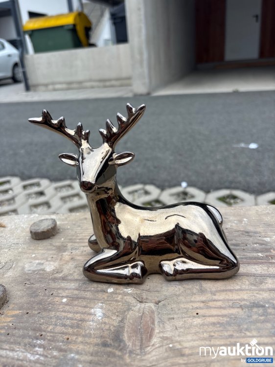 Artikel Nr. 934842: Deko liegendes Rentier in gold