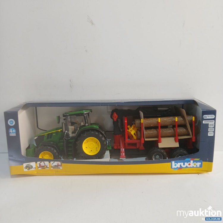 Artikel Nr. 464844 Artikel Nr. 464844: Bruder John Deere 7R 350 + Rückenanhänger und 4 Baumstämme