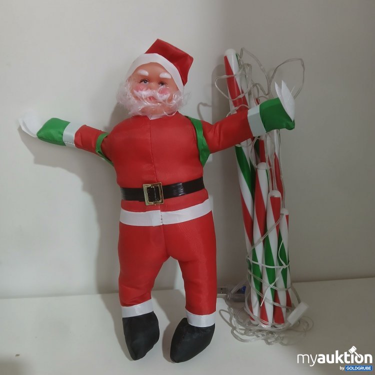 Artikel Nr. 994853 Artikel Nr. 994853: Weihnachtsmann ca 31 cm Puppe mit Led Zuckerstangen