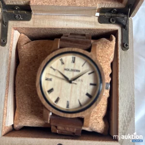 Auktion Holzkern Herrenuhr beschädigt